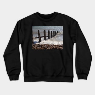 Sea defences on Dungeness beach Crewneck Sweatshirt